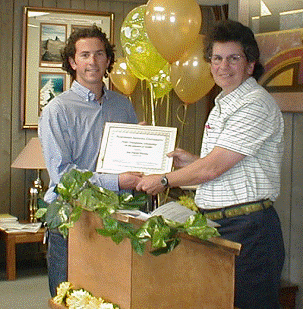 Jon David Pierson receiving award